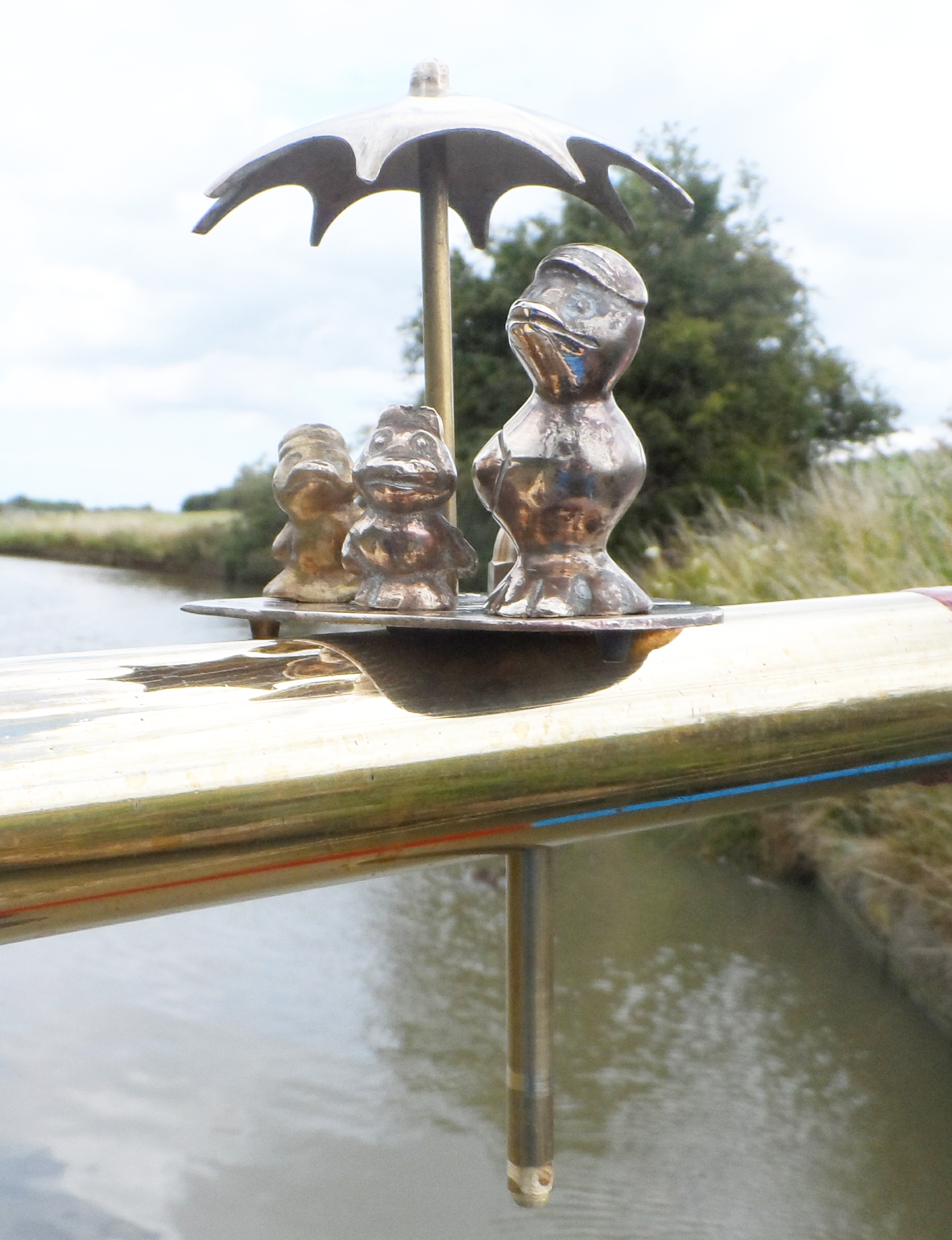 Stylised Bird Family under an Umbrella (image for) Stylised Bird Family under an Umbrella